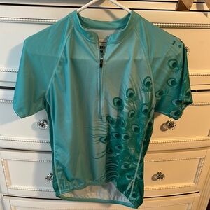 Cannondale Teal Cycling Jersey with Peacock Design SZ M
